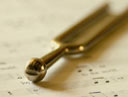 Tuning fork on a sheet of music
